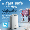 The Avalla X-200 dehumidifier safely drying delicate clothes.