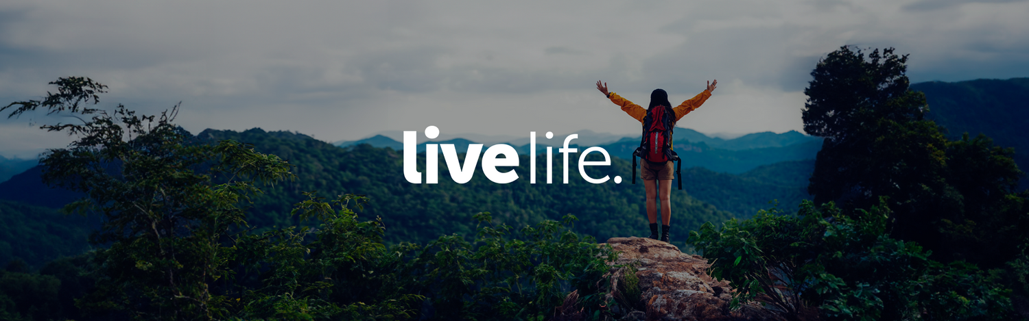 Woman enjoying a hike up a mountain as a part of Avalla livelife.